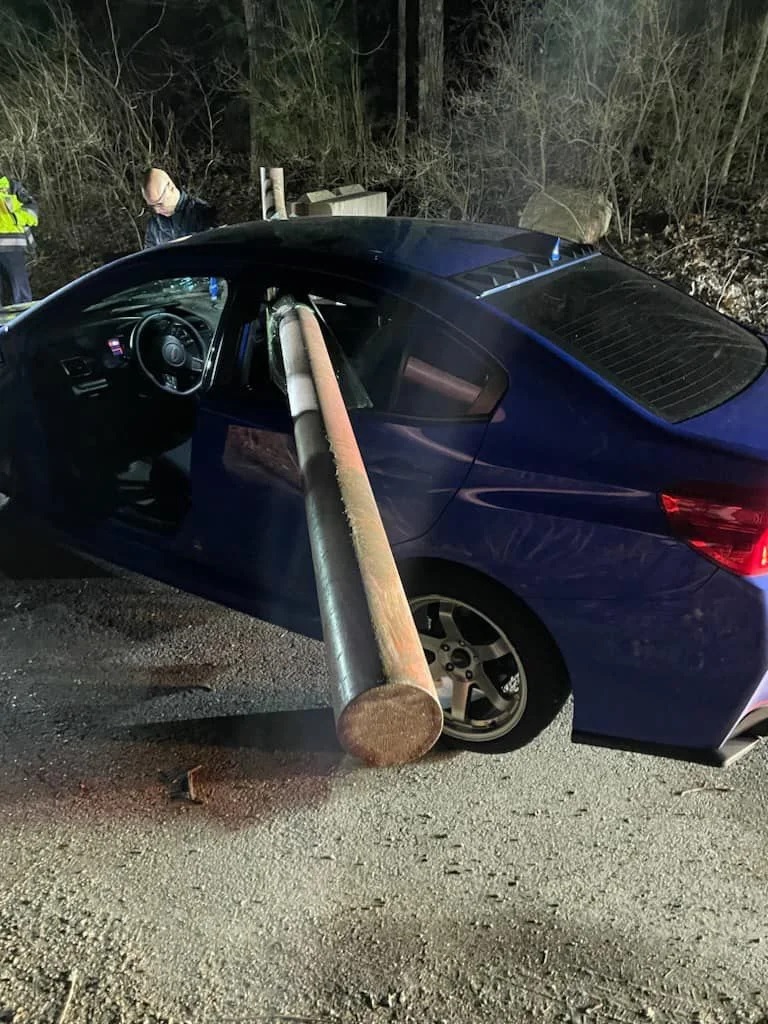 March 2024 - Car impaled by metal barrier gate on access road to MBTA station - 2